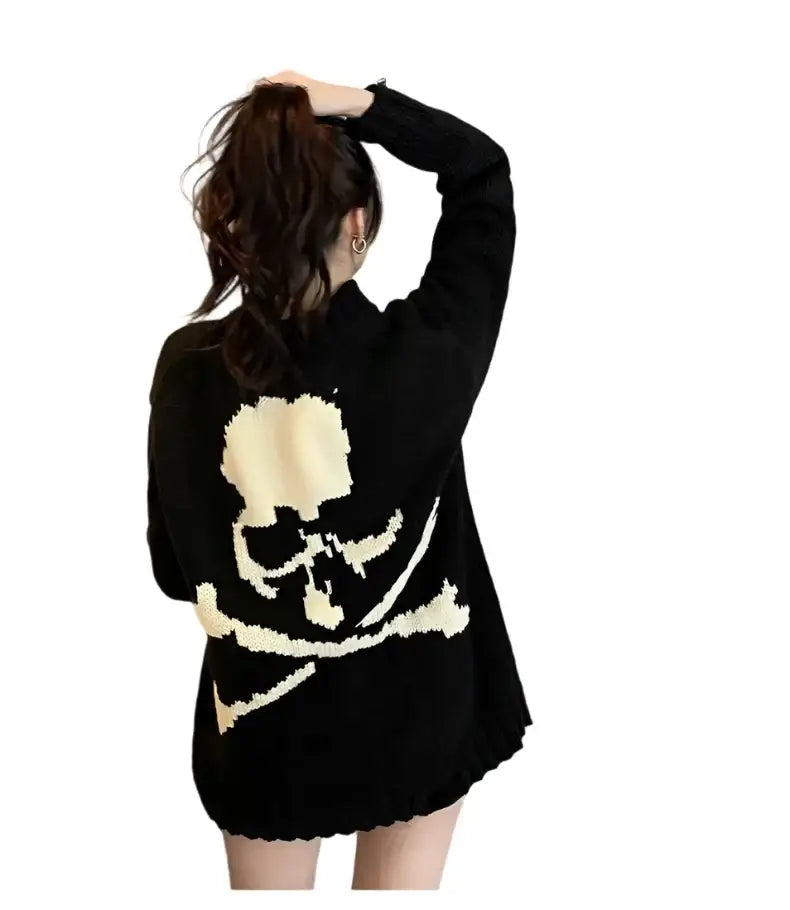 Black skull sweater with crossbones design on back, perfect for women’s Y2K fashion