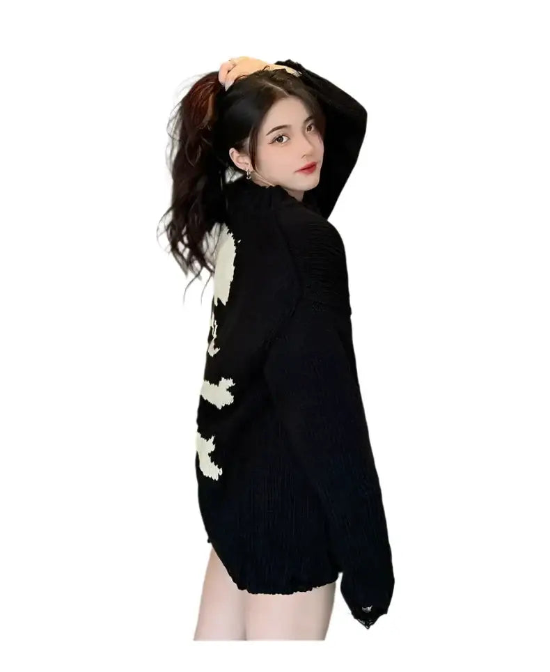 Black Skull Sweater with white floral designs, perfect for Y2K womens clothing