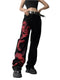 Trendy snake jeans with red dragon design, studded belt, and chunky shoes