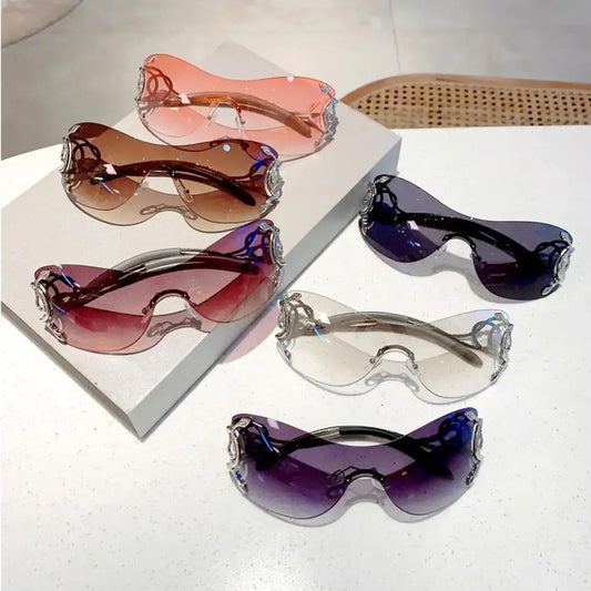 Collection of Snake Sunglasses featuring stylish decorative frames and tinted lenses