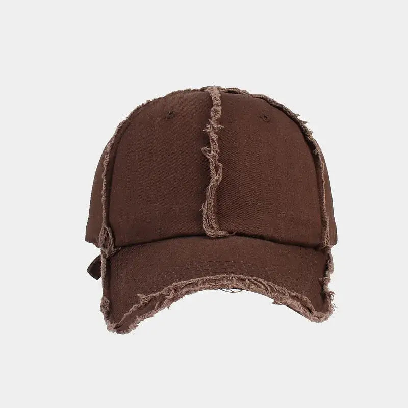 Brown distressed snapback cap with frayed edges for a stylish Y2K look