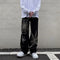 Black spider sweatpants with white spider web designs for stylish Y2K clothing men