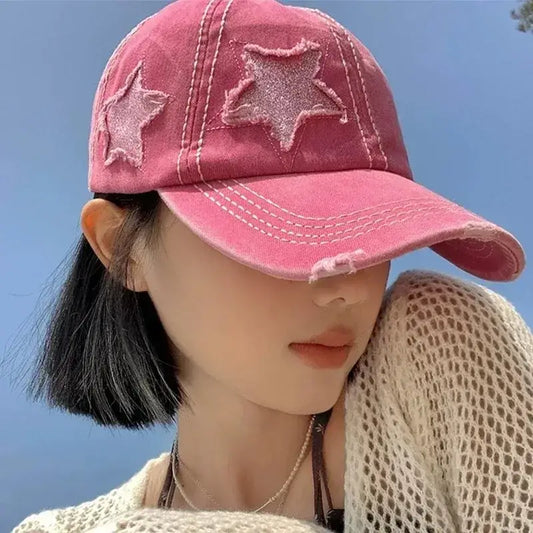 Pink star cap with trendy designs, perfect for Y2K fashion enthusiasts