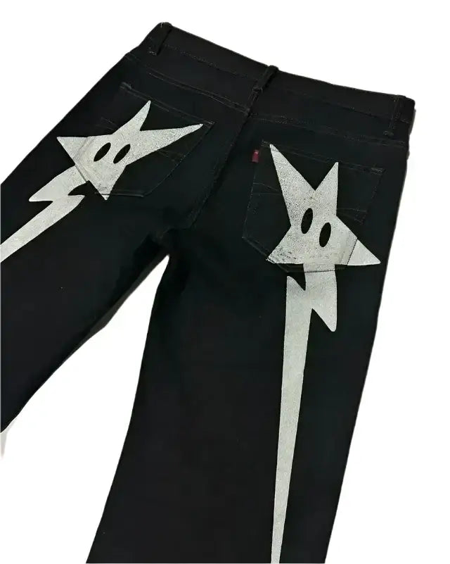 Black jeans Y2K with white star-shaped designs on back pockets, perfect for stylish looks