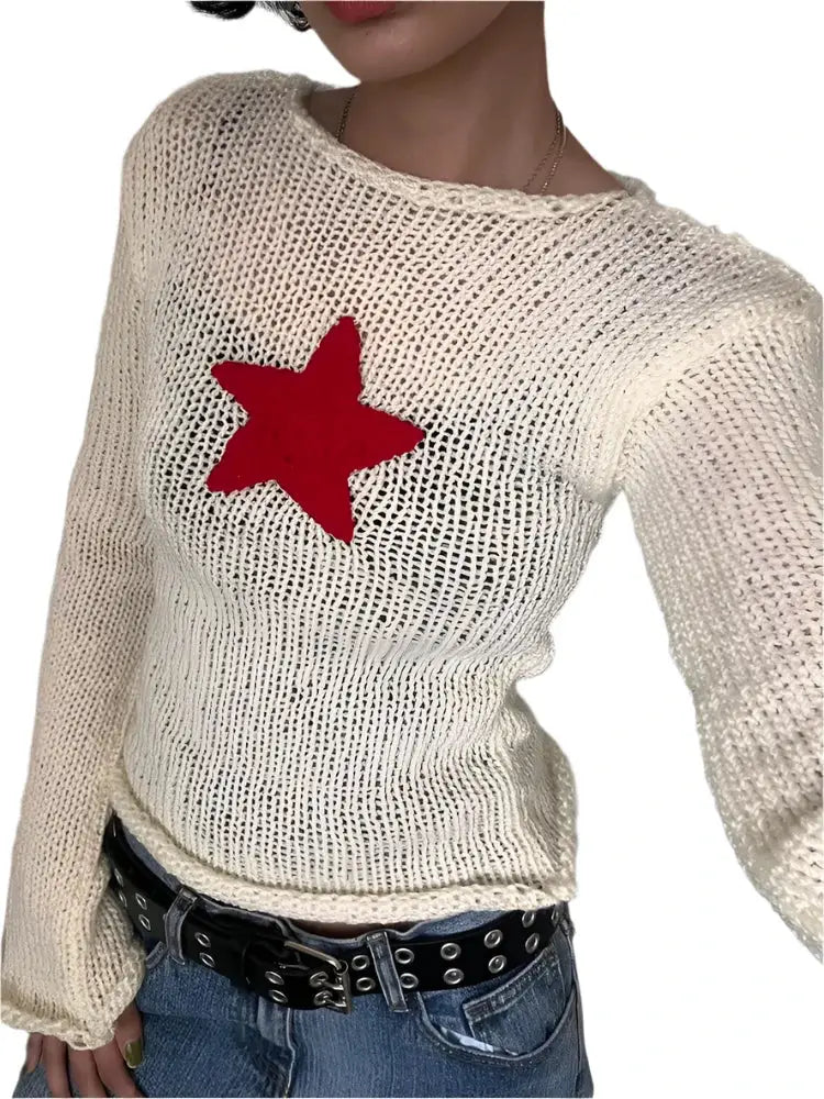 Cream-colored knit sweater featuring a red star for a stylish star knit sweater look