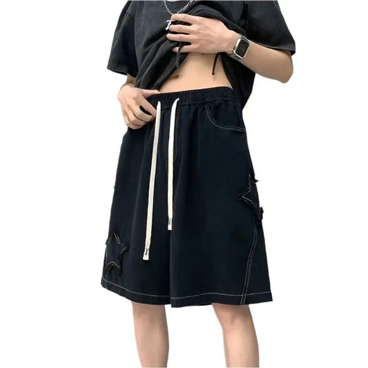 Black Star Shorts with drawstring waist and contrasting stitching for comfortable Y2K style