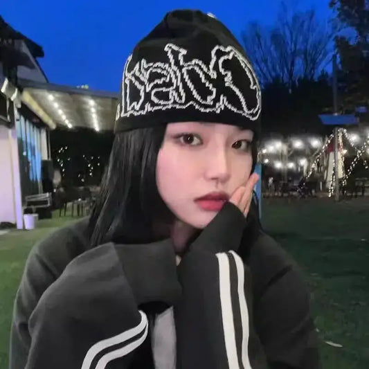 Young woman in a streetwear beanie showcasing y2k style while staying warm