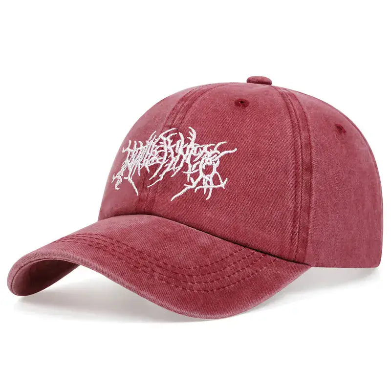 Red streetwear cap featuring white embroidered text for a stylish Y2K fashion accessory