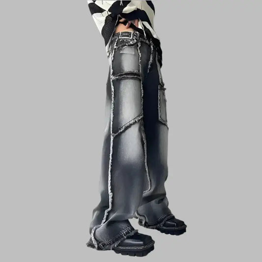 Futuristic oversized black boots with chunky soles styled with Streetwear Jeans in Y2K zone