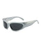 Sporty silver-framed Y2K sunglasses with dark lenses in trendy streetwear style