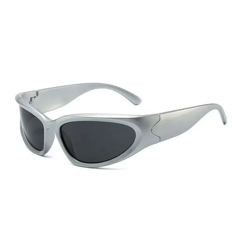 Sporty silver-framed Y2K sunglasses with dark lenses and wraparound design for streetwear style