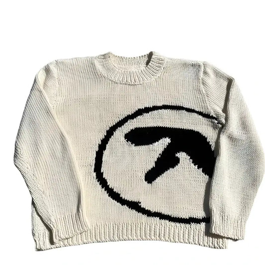 Cream-colored knit sweater with black arrow design for stylish Streetwear Sweats