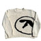 Cream-colored knit sweater with black arrow design for stylish Streetwear Sweats