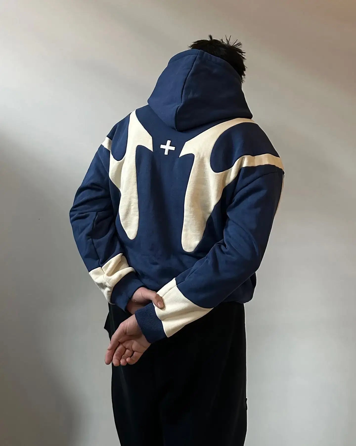 Navy blue and cream unisex streetwear zip hoodie with unique back design