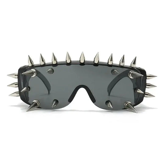 Sunglasses Spikes featuring dark glasses with metal spikes for a bold Y2K look that turns heads