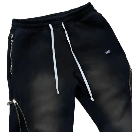 Black sweat pants with zipper fly and white drawstring for a stylish Y2K look