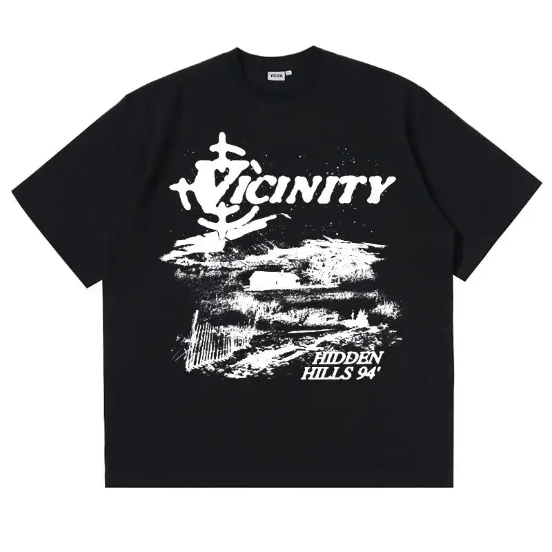 Black T-shirt graphic art featuring white Vicinity text and landscape design