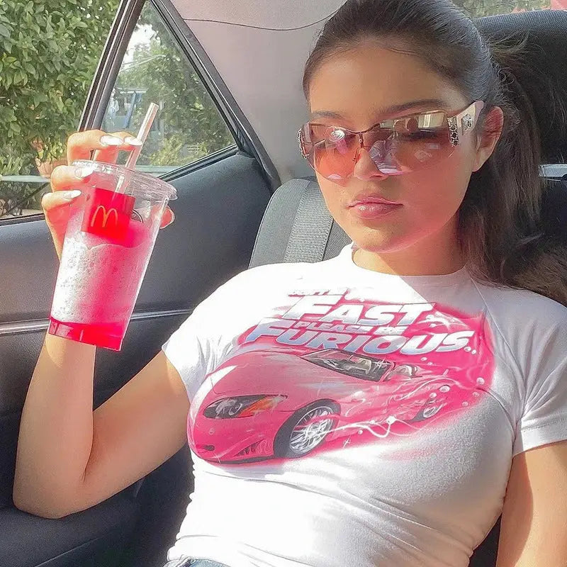 Woman in sunglasses and a Fast and Furious t-shirt showcasing That Bitch Crop Top