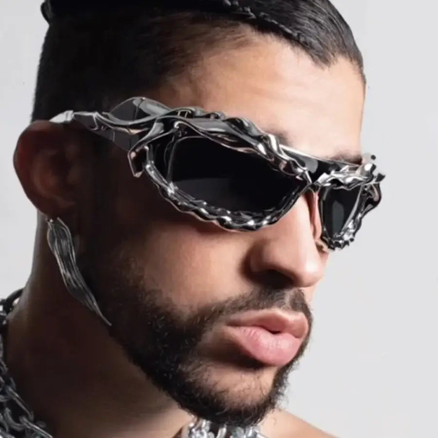 Stylish Unique Sunglasses with metallic frame and plastic lenses worn by a man with facial hair