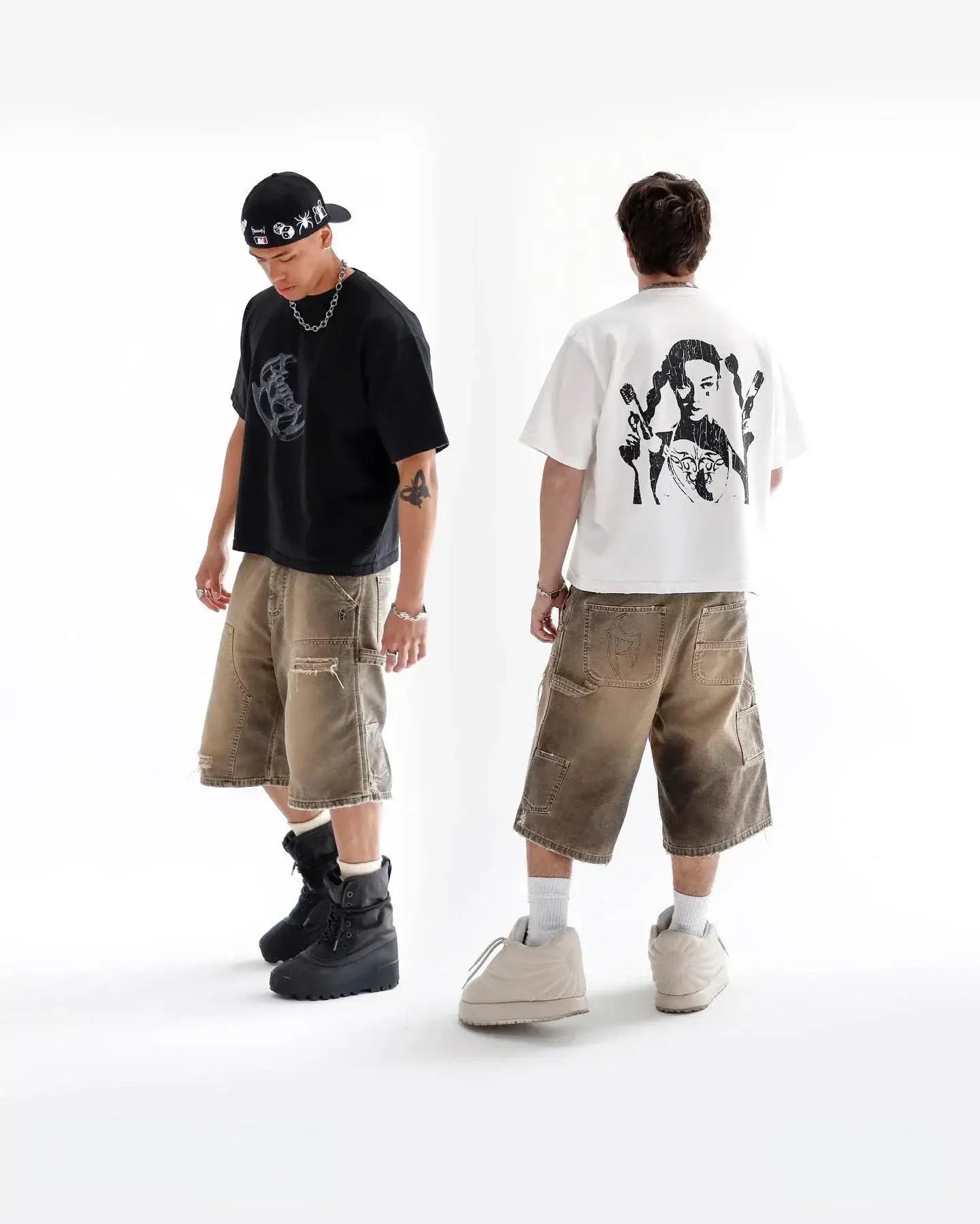 Two men in casual streetwear showcasing stylish utility cargo shorts