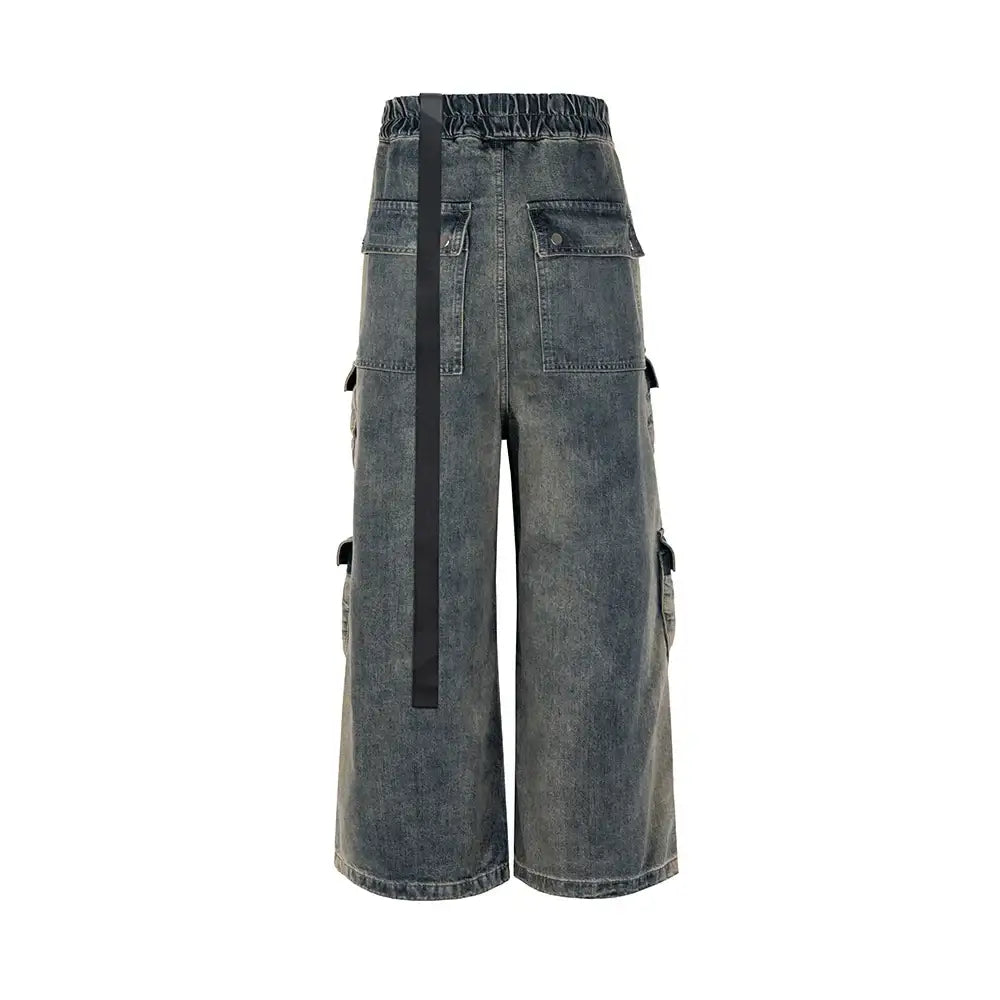 Wide-leg Vintage Cargo Jeans featuring multiple pockets and a long belt strap