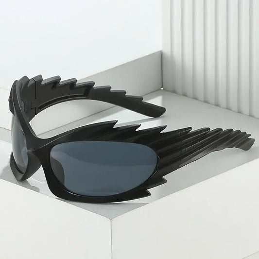 Stylized Vortex Sunglasses featuring wing-like extensions and a trendy Y2K design