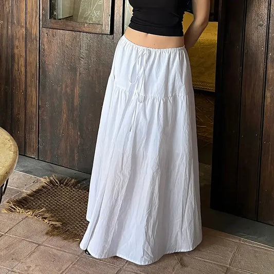 Long white flowy maxi skirt with tiered design perfect for any occasion