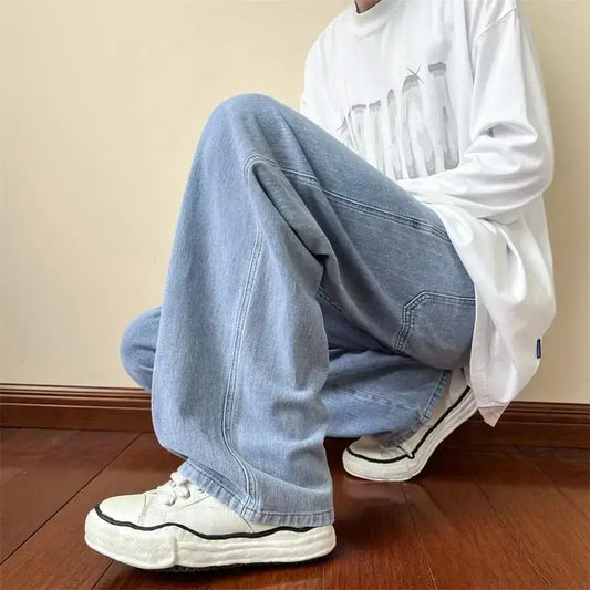 Wide-leg jeans in light blue styling with white sneakers and a white top for Y2K flair