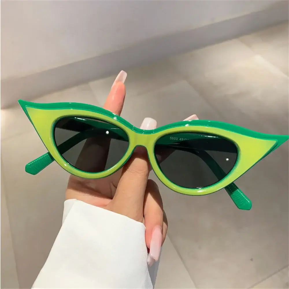 Retro cat-eye sunglasses in bright green frames for Y2K fashion sunglasses collection