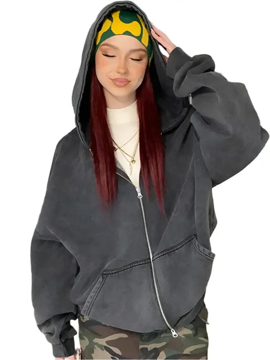 Woman in a Y2K Grey Hoodie with a colorful headband showcasing a trendy style