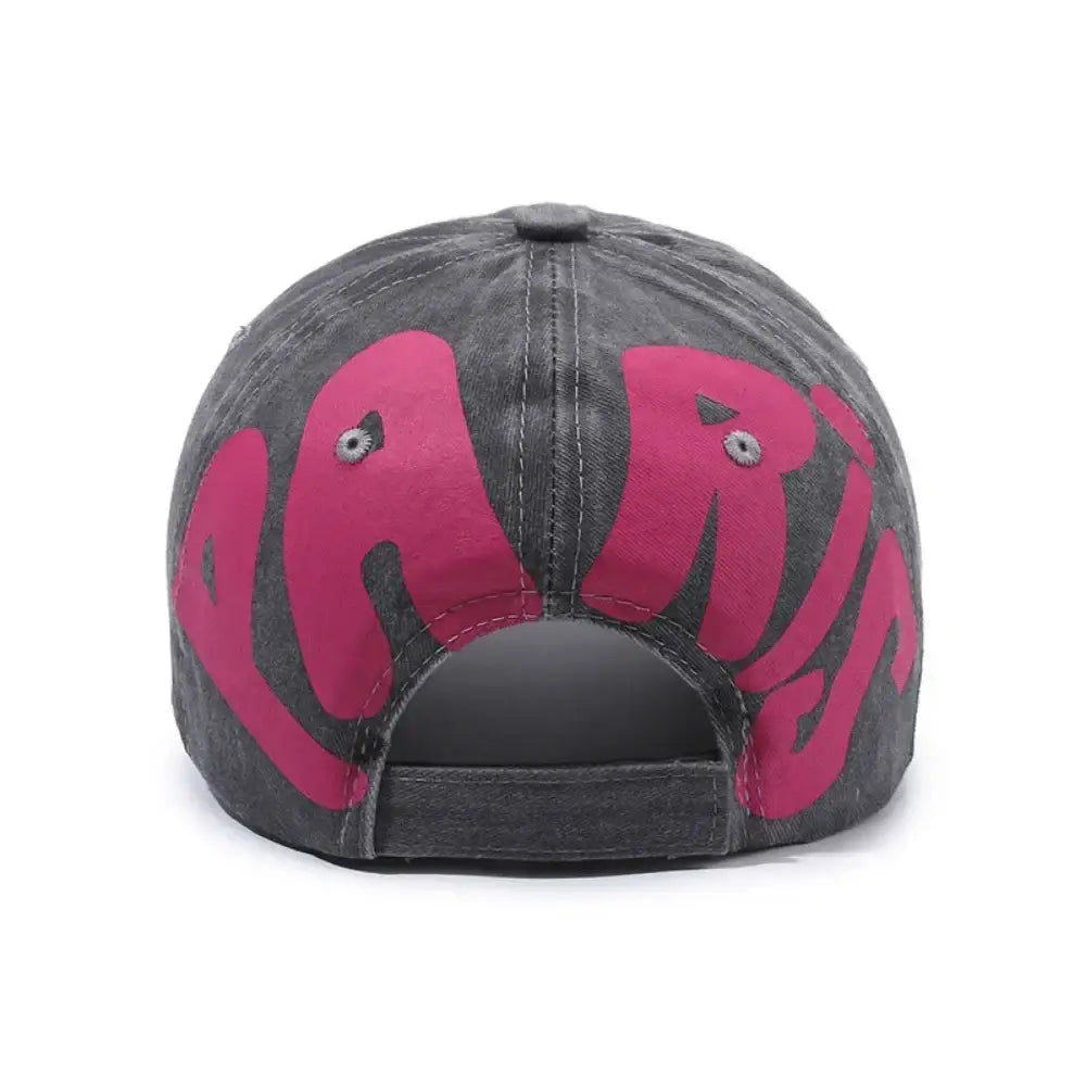 Gray Y2K hat featuring a bold pink design on the back for trendy Y2K fashion