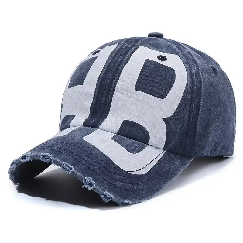 Navy blue Y2K hat featuring large white JB letters for trendy Y2K fashion