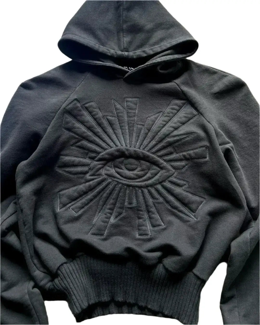 Black Y2K hoodie design featuring an embossed all-seeing eye on the front