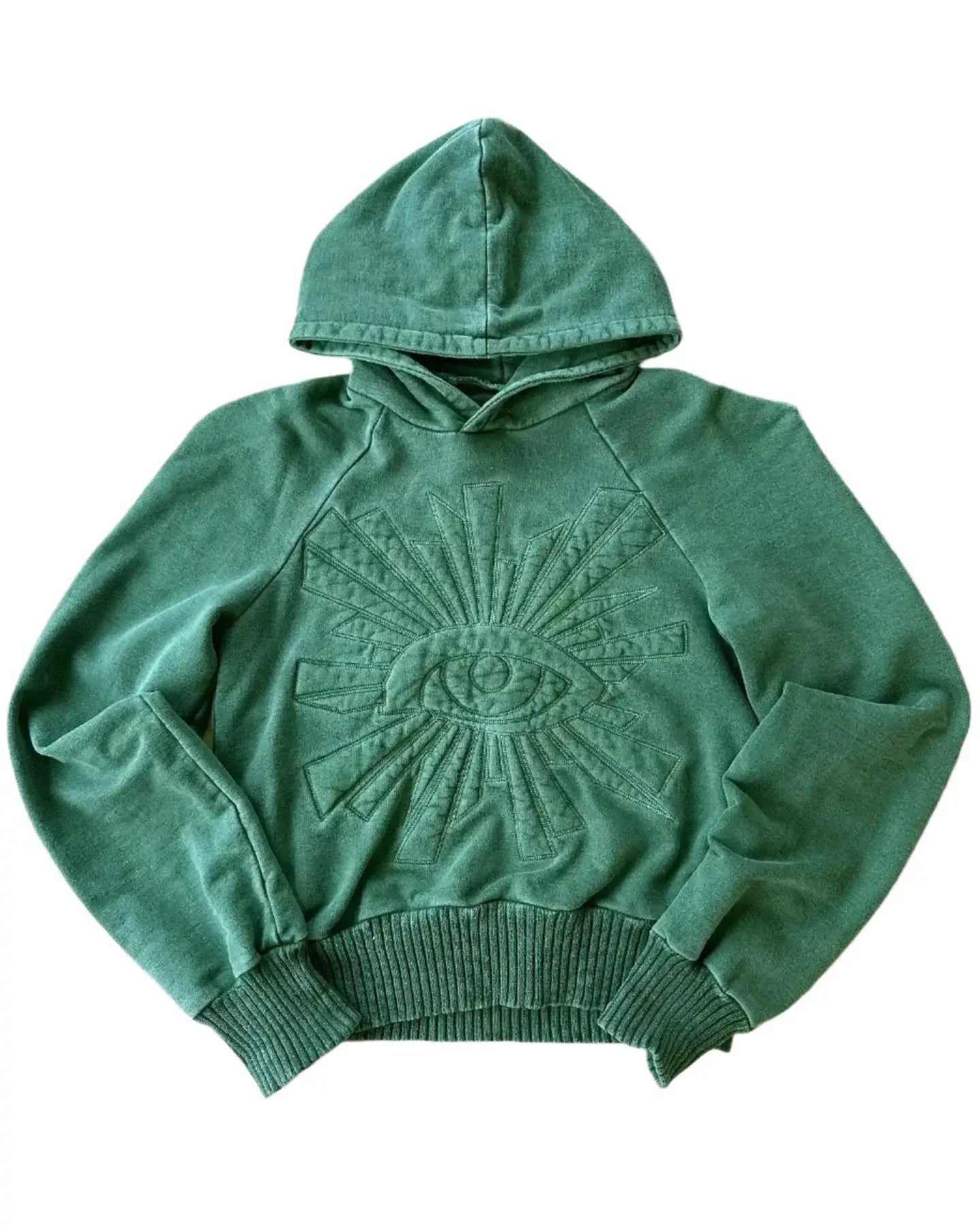 Green Y2K hoodie design featuring embossed eye graphic on the front