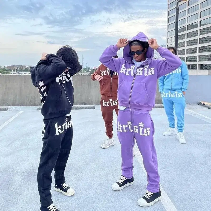 Group of people in colorful matching tracksuits showcasing Y2K Purple Hoodie with Krista branding