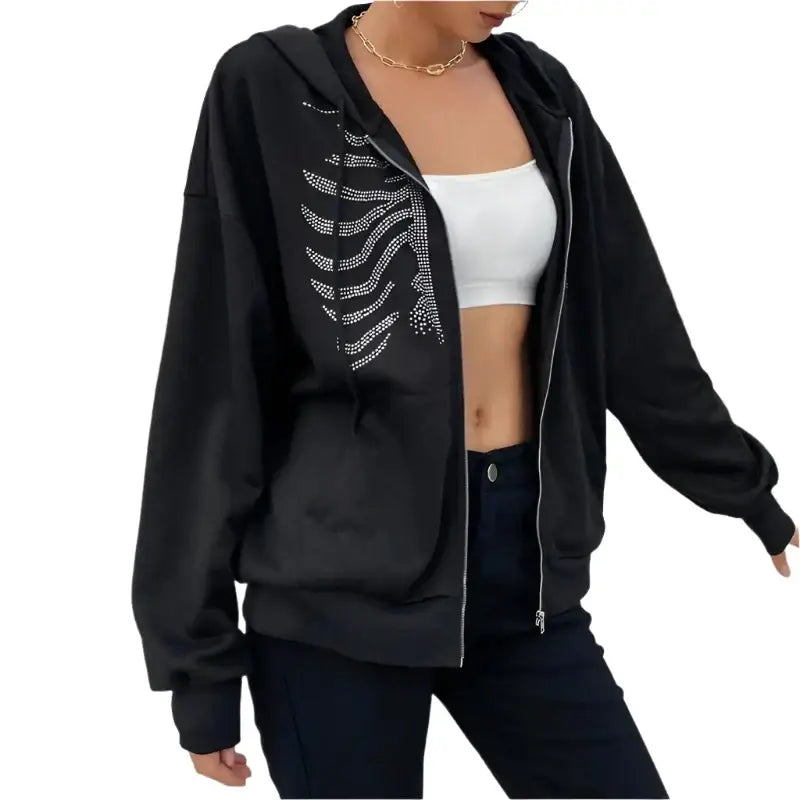 Black zip-up Y2K rhinestone skeleton hoodie with silver skeletal rib cage design