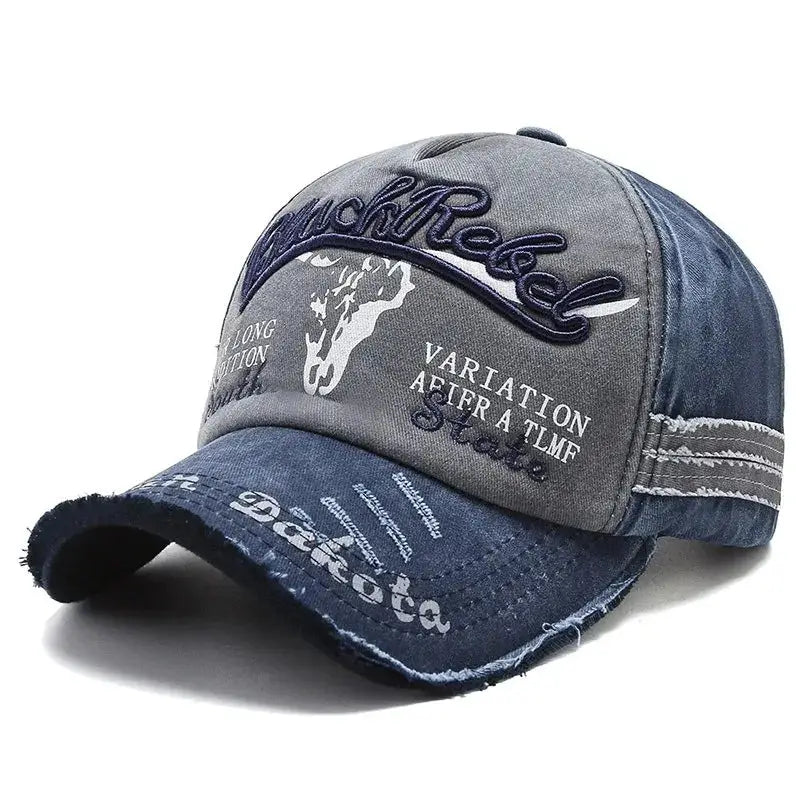 Distressed blue and gray Y2K Trucker Cap with embroidered text and bull logo