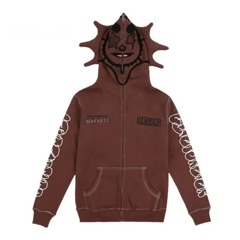 Brown Y2K Zip hoodie with monster-like hood and graphic sleeves for unique style